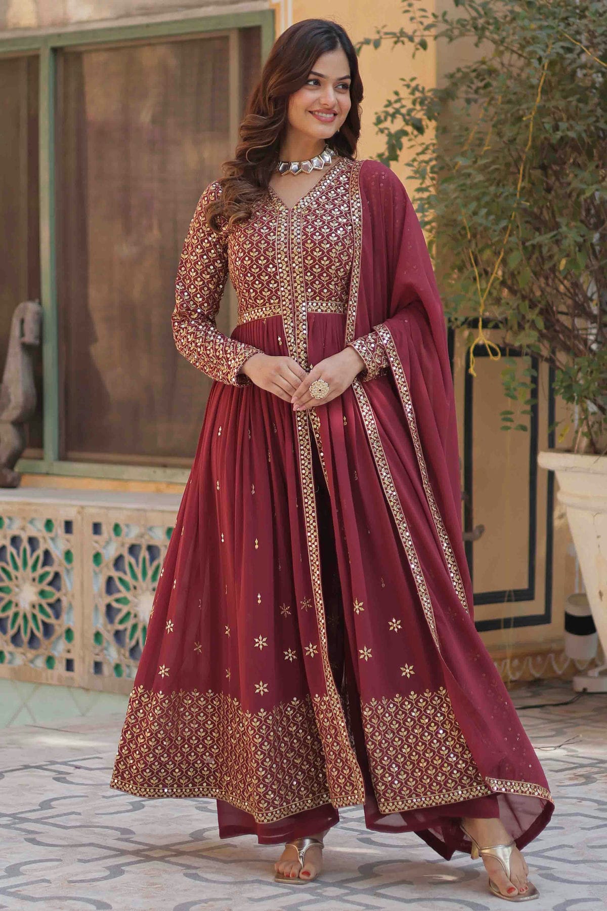 Maroon Colour Stitched Faux Georgette Gown