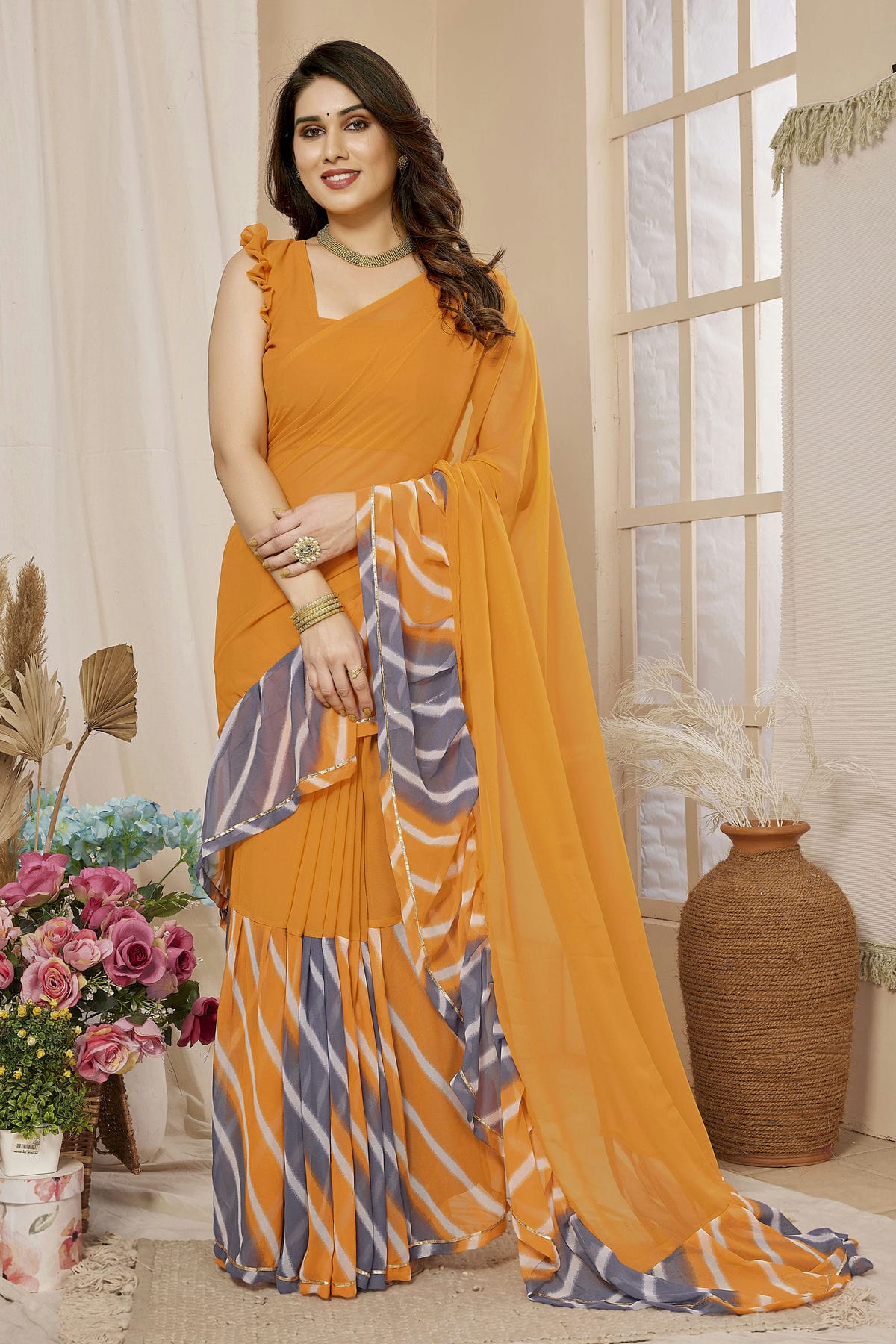 Orange Colour Georgette Ruffle Saree