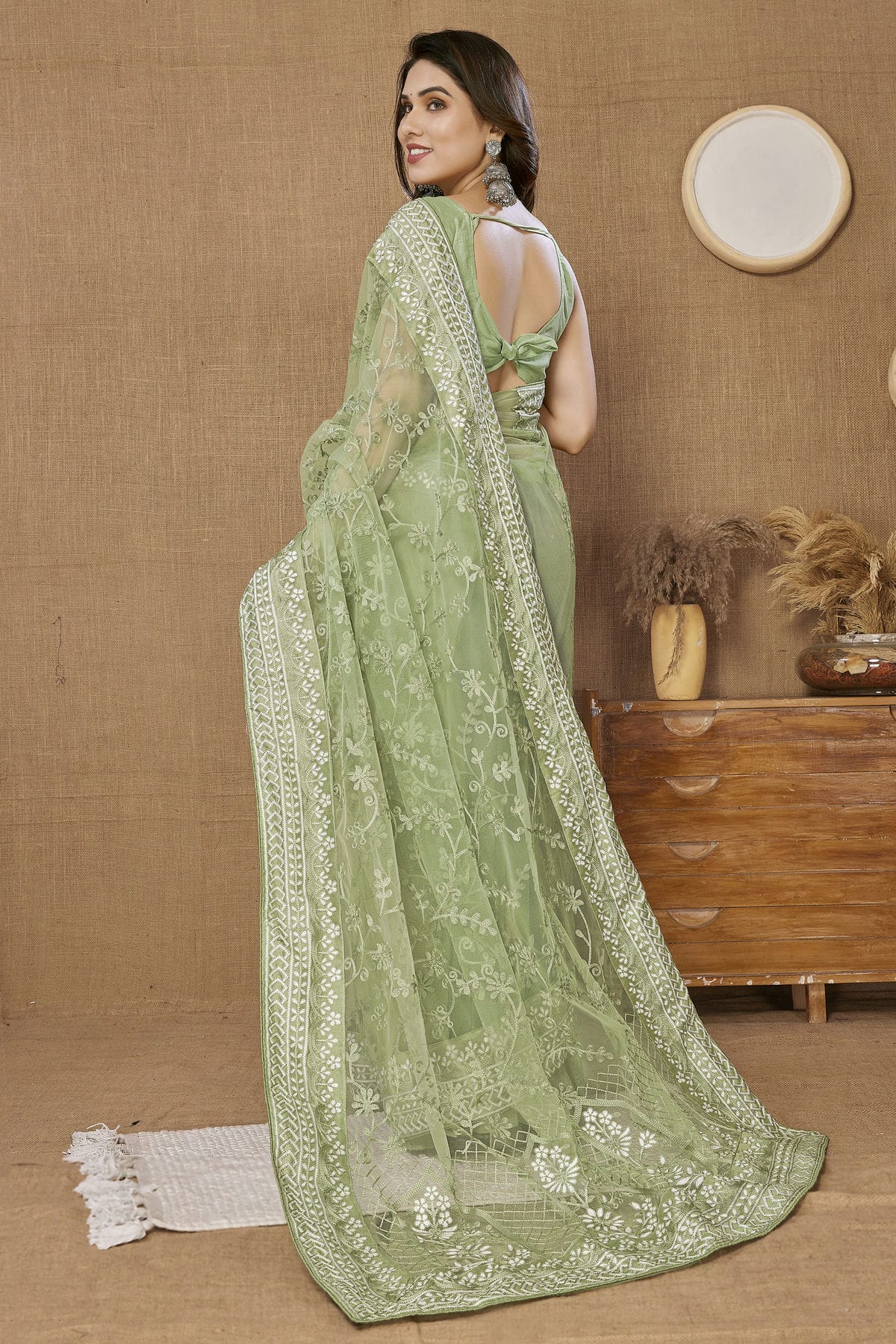 Pista Green Colour Soft Net Saree