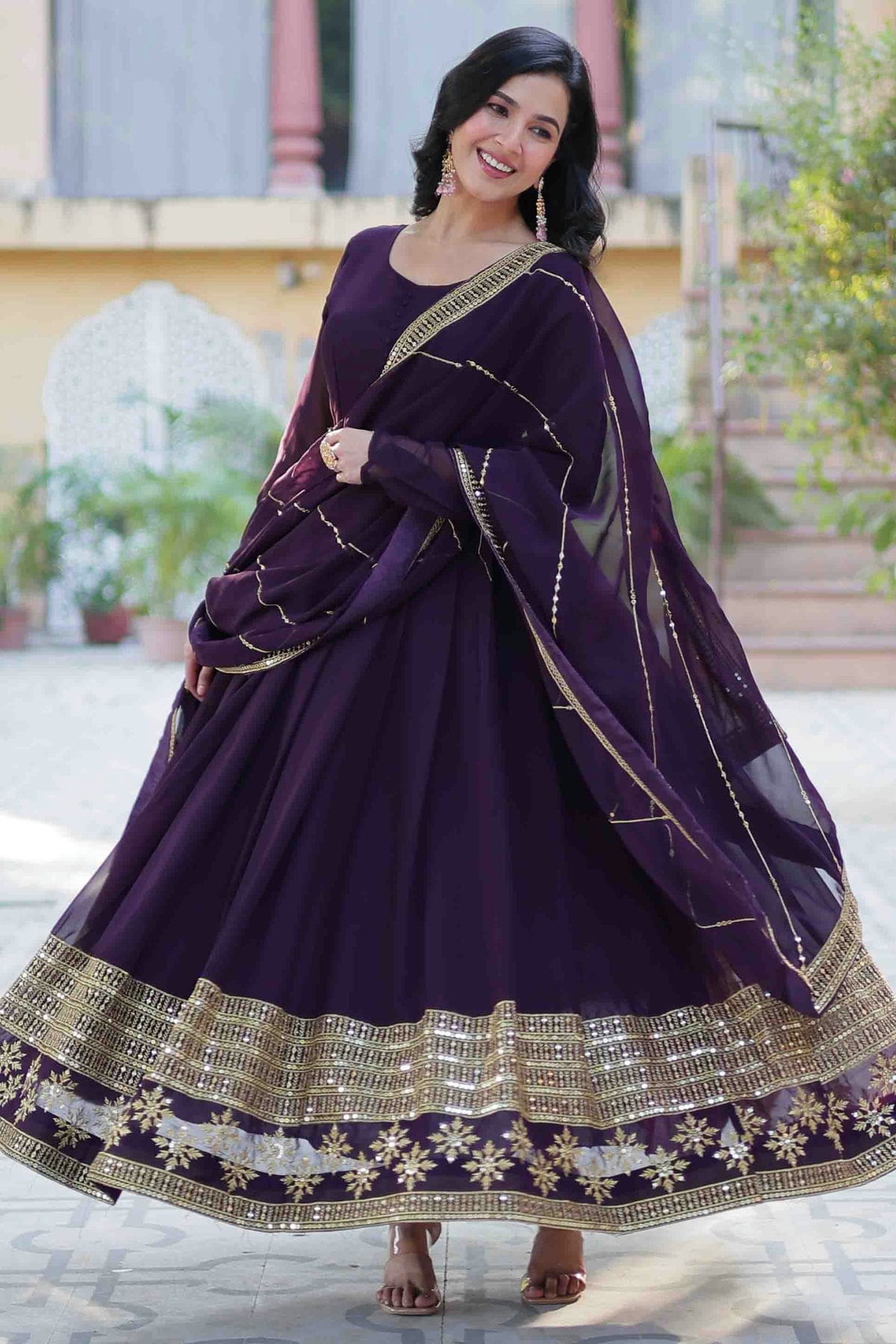 Purple Colour Stitched Faux Georgette Gown