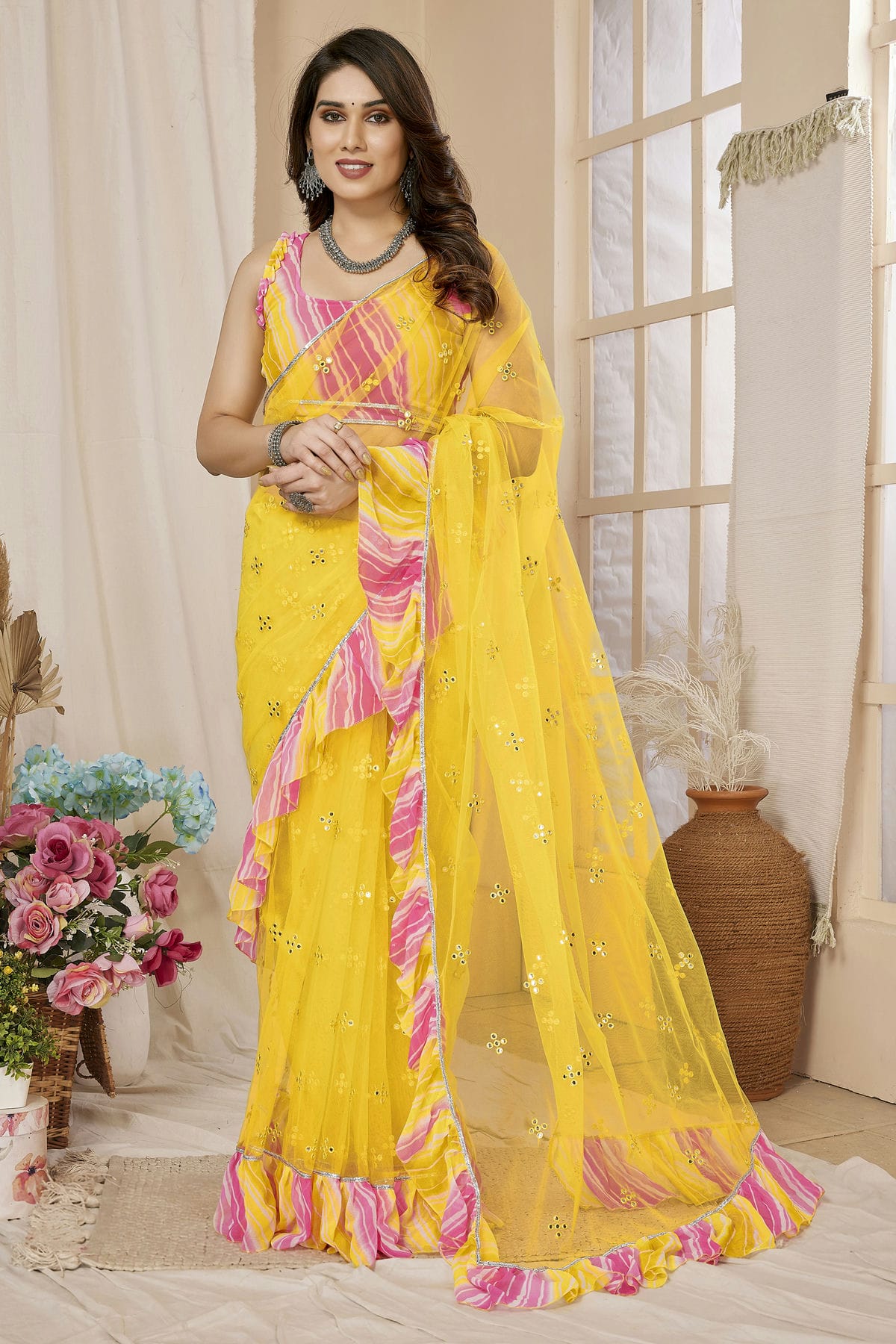 Yellow Colour Net Ruffle Saree