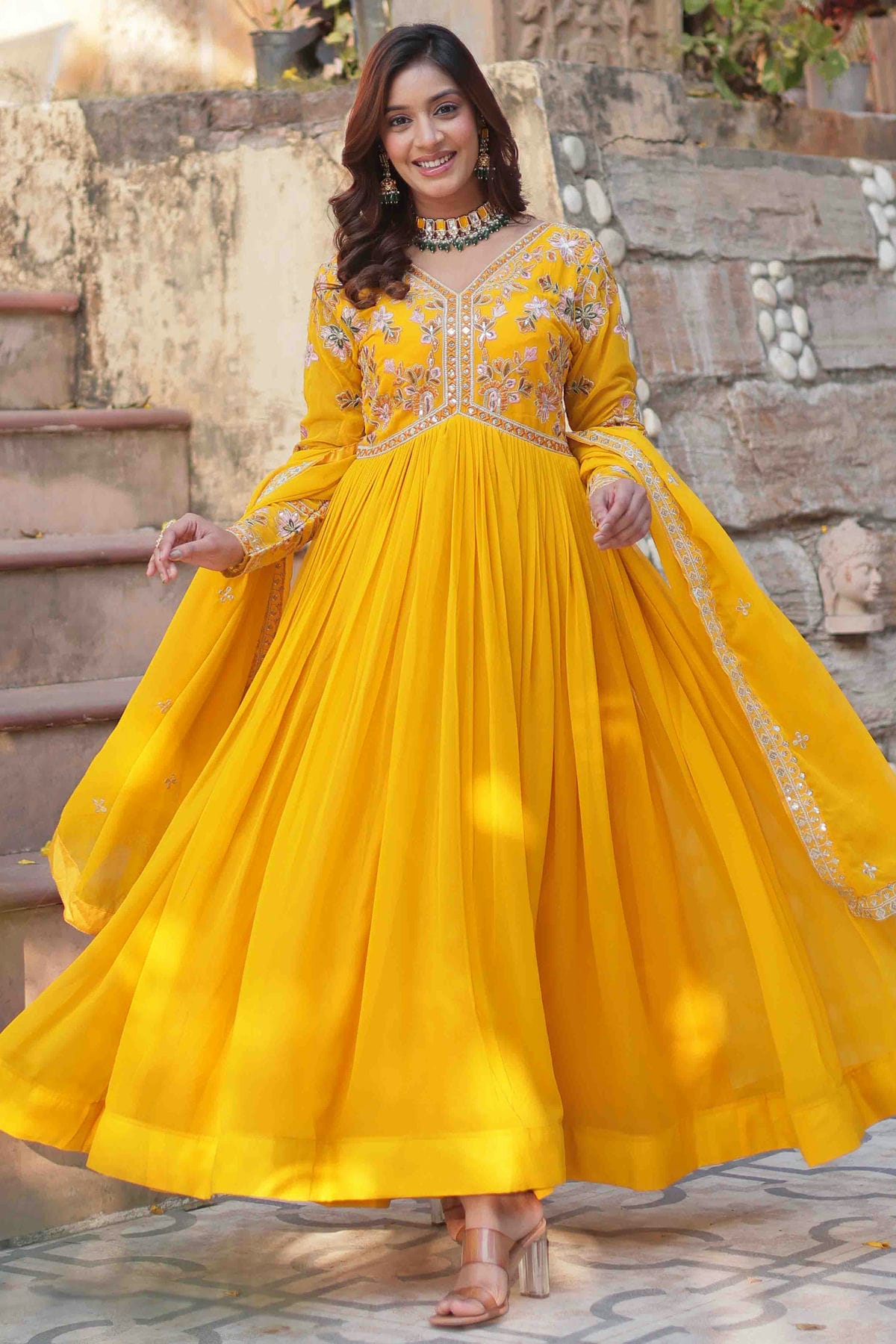 Yellow Colour Stitched Faux Georgette Gown