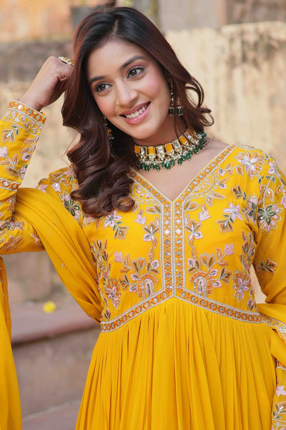 Yellow Colour Stitched Faux Georgette Gown