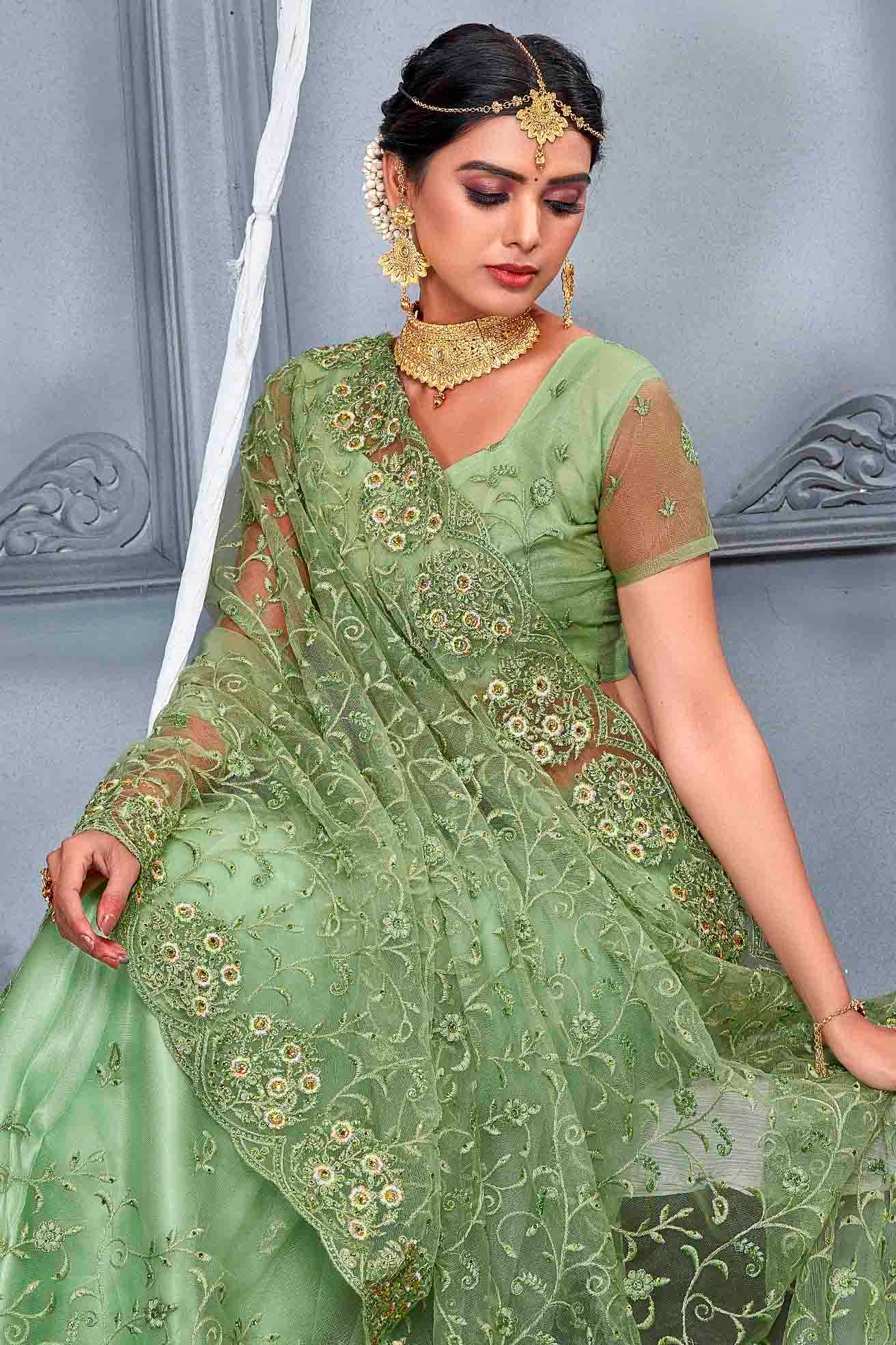 Dusty Pista Green Colour Net Designer Saree