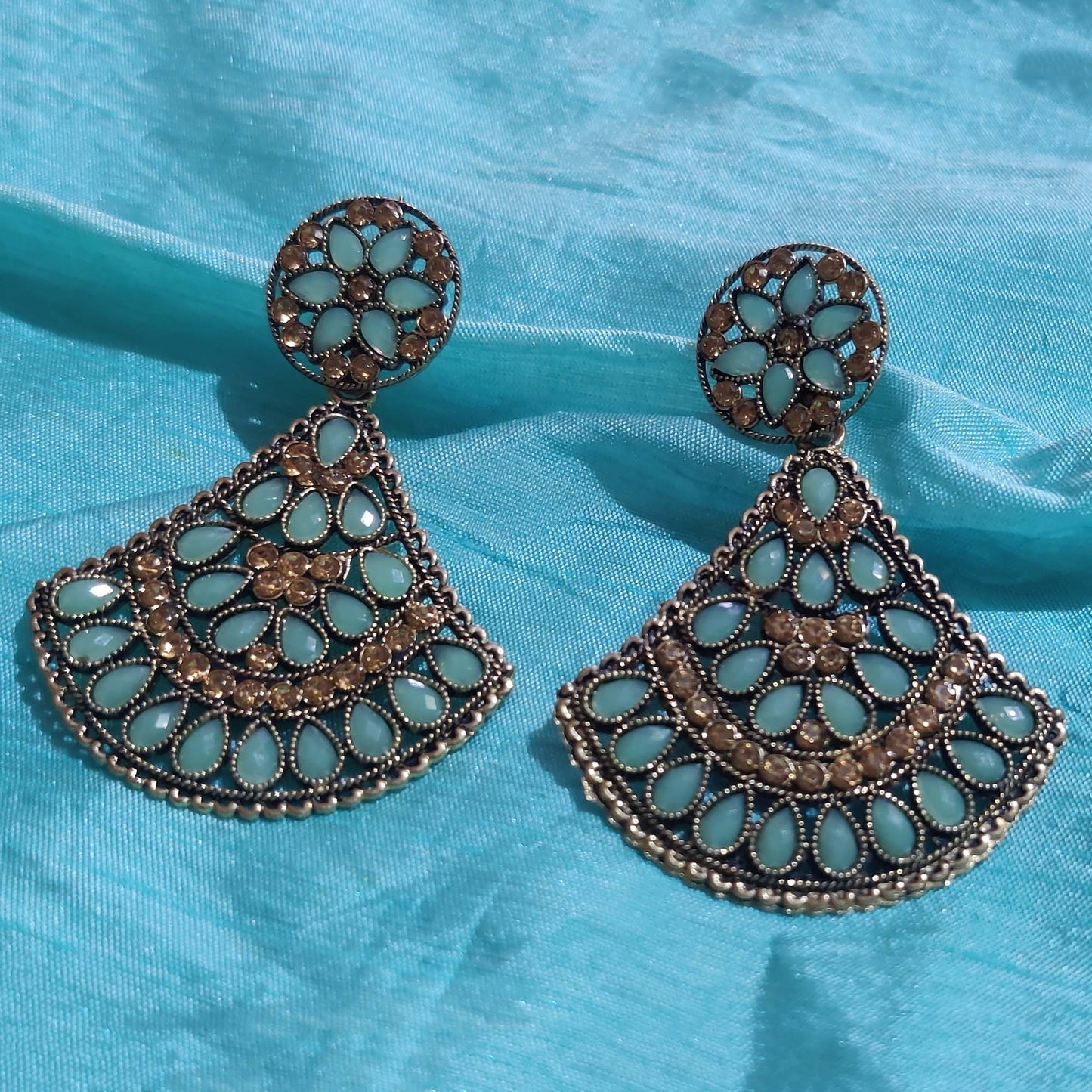 Vastradi Alloy Crystal Fan Stone Work Earring in Aqua Blue Colour