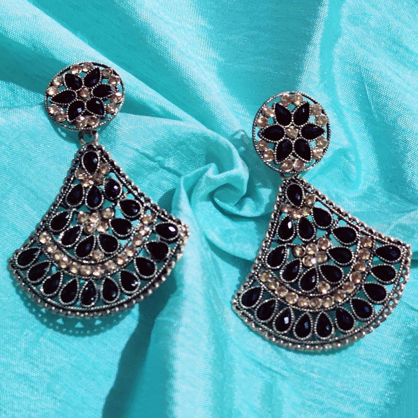 Vastradi Alloy Crystal Fan Stone Work Earring in Black Colour