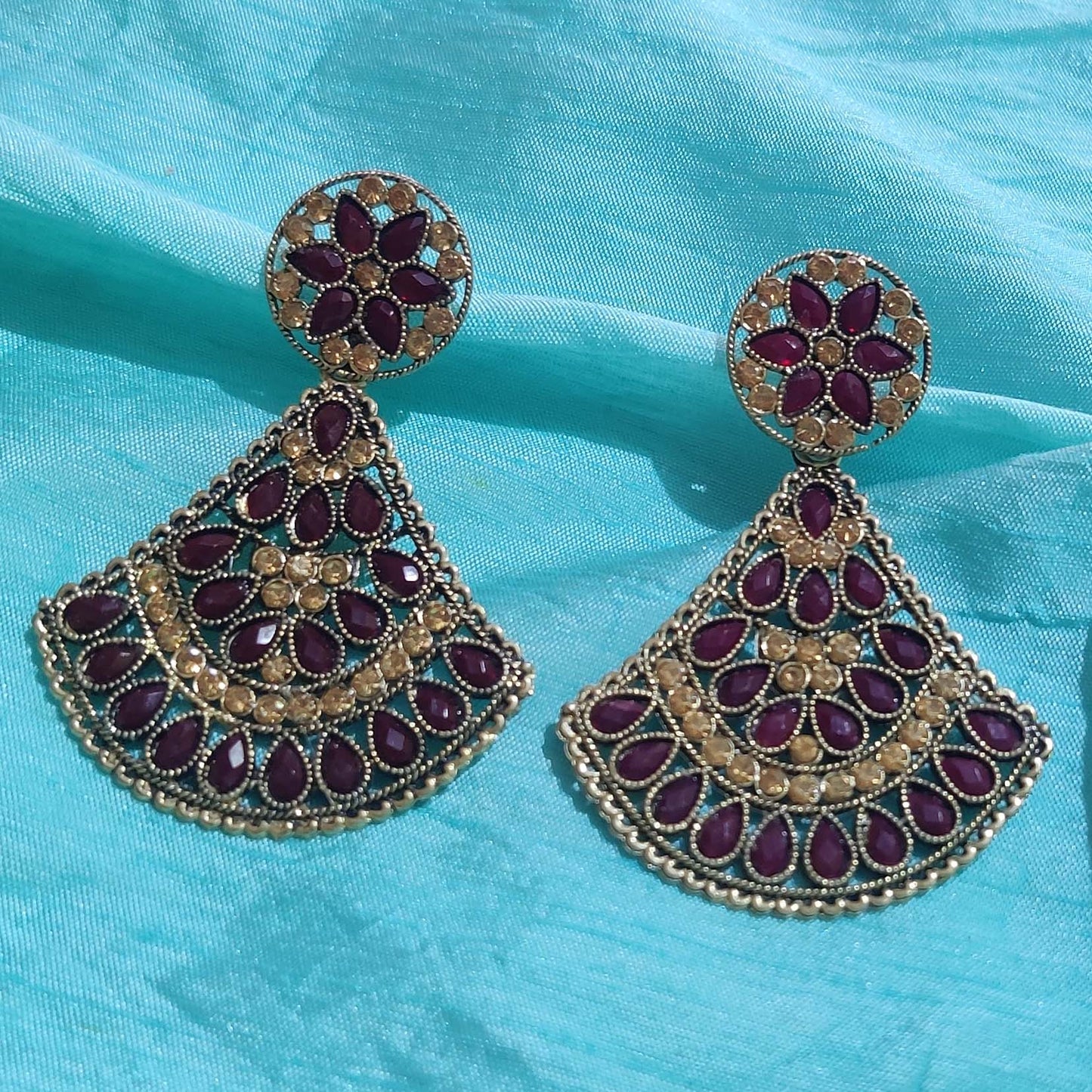 Vastradi Alloy Crystal Fan Stone Work Earring in Purple Colour