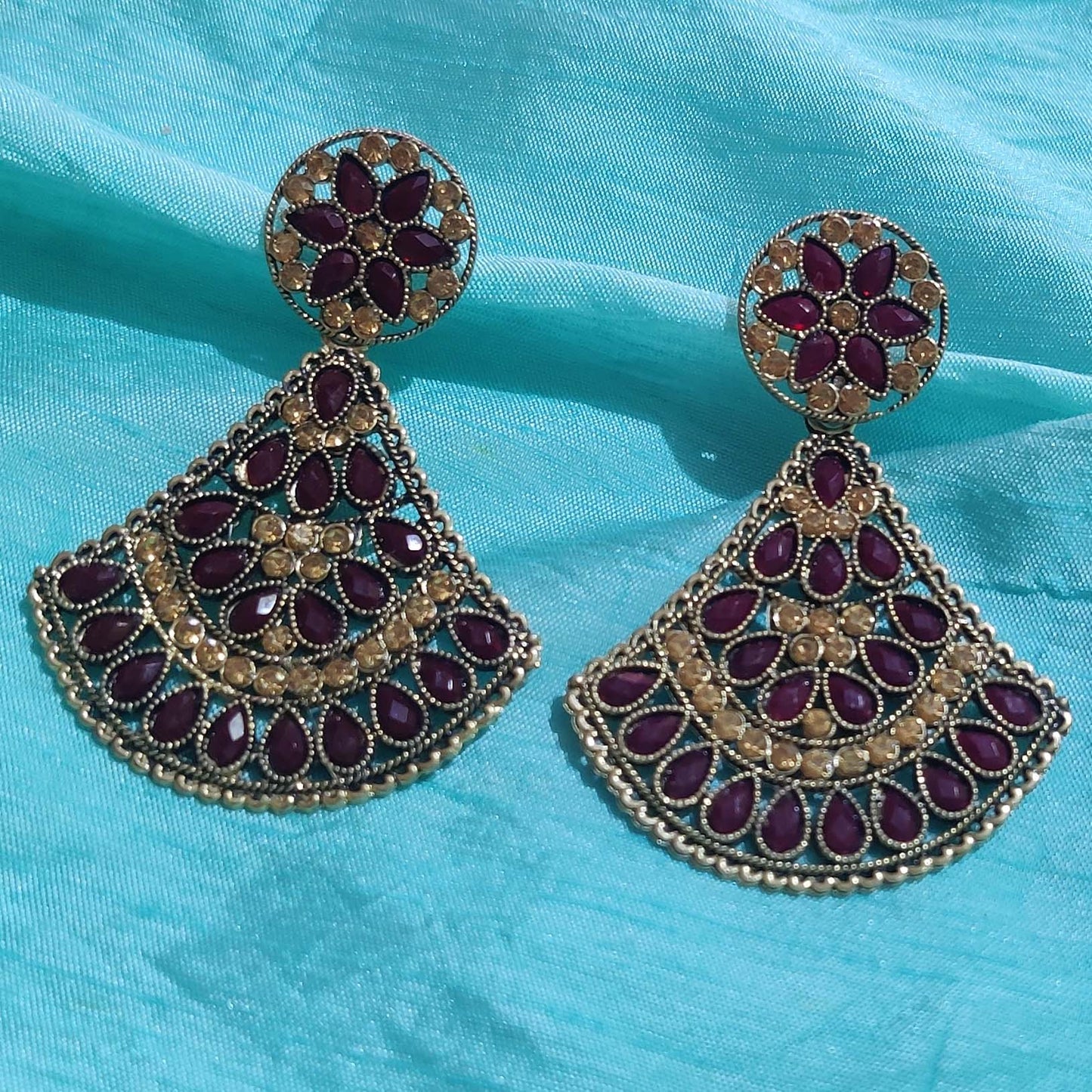 Vastradi Alloy Crystal Fan Stone Work Earring in Purple Colour