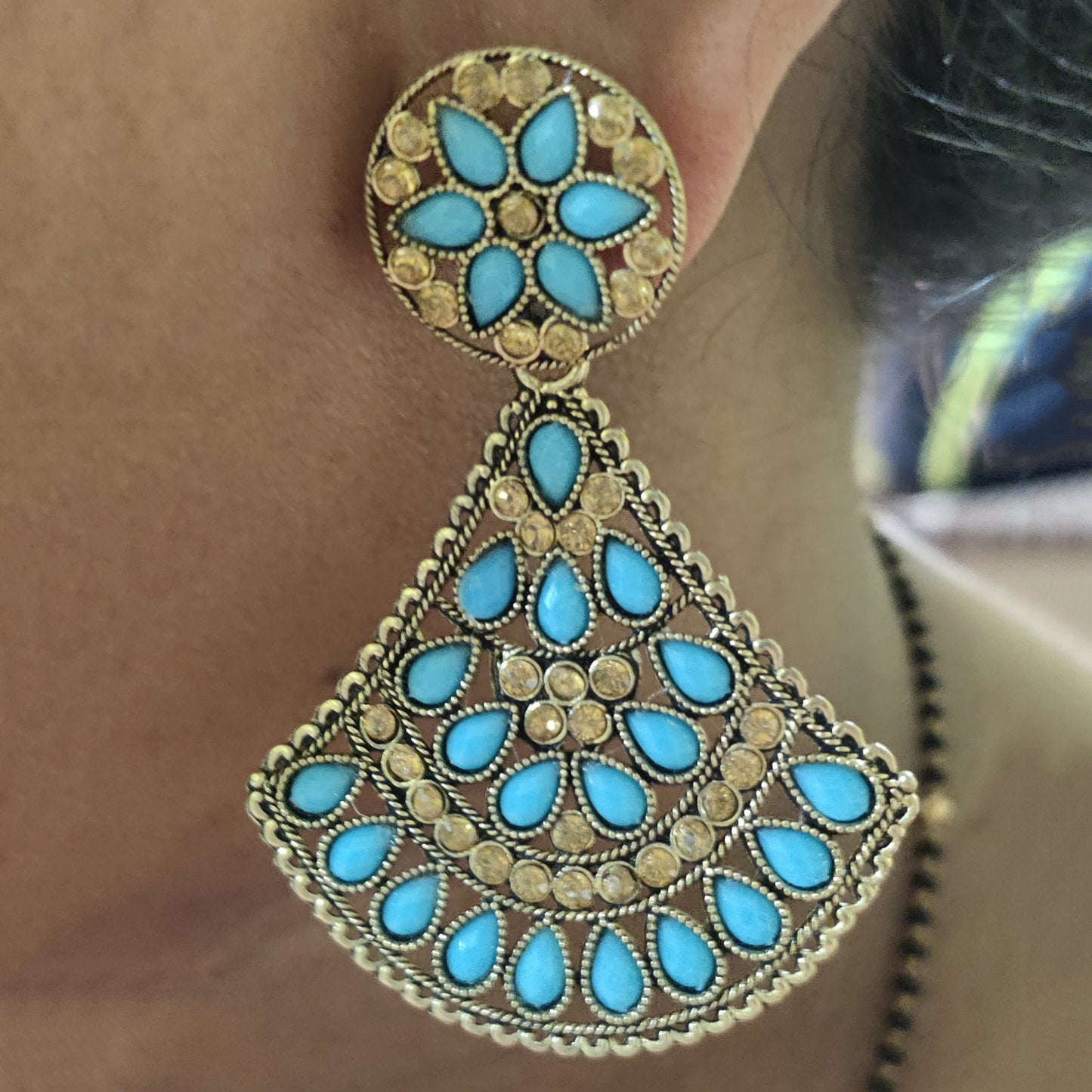 Vastradi Alloy Crystal Fan Stone Work Earring in Sky Blue Colour