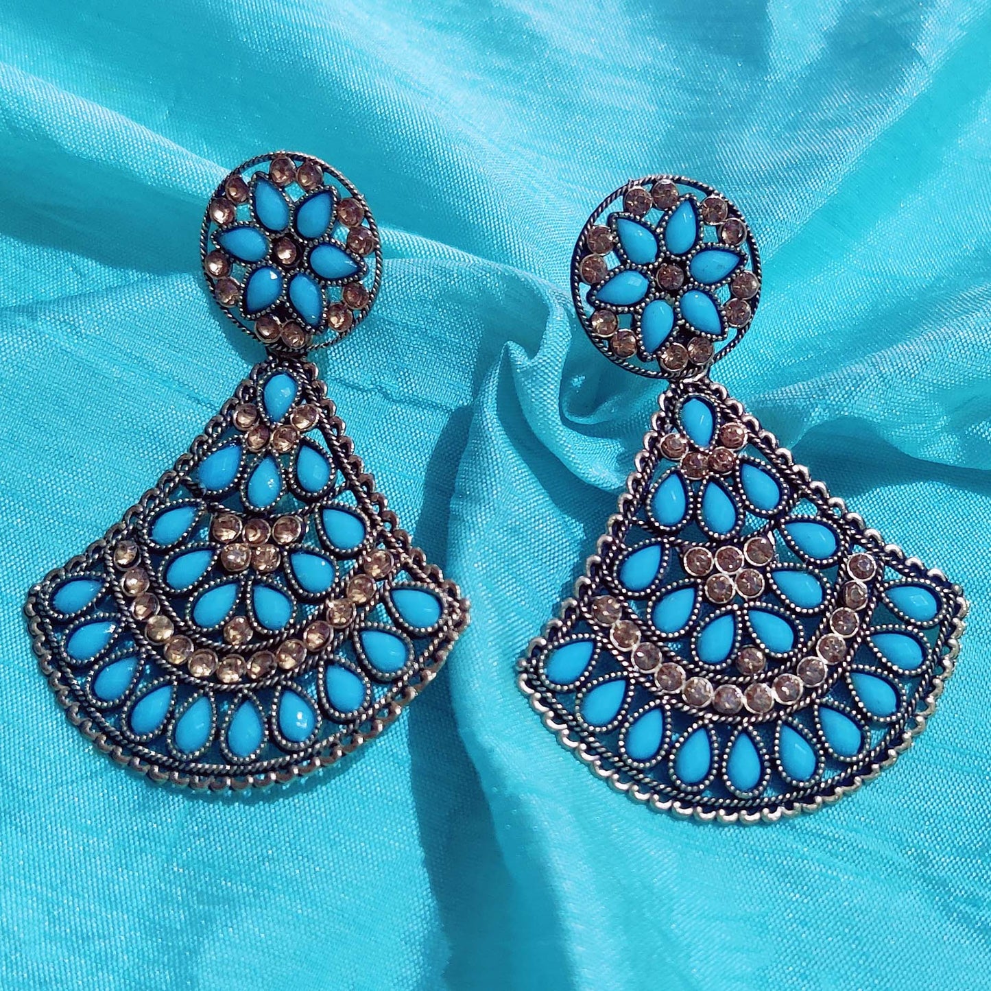 Vastradi Alloy Crystal Fan Stone Work Earring in Sky Blue Colour