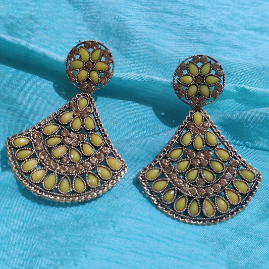 Vastradi Alloy Crystal Fan Stone Work Earring in Yellow Colour