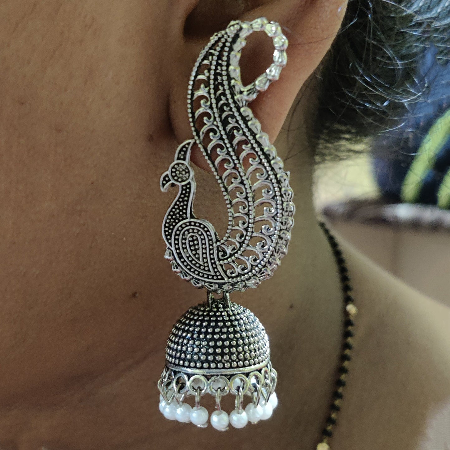 Vastradi Alloy Exclusive Traditional Jhumka in Sliver and White Colour