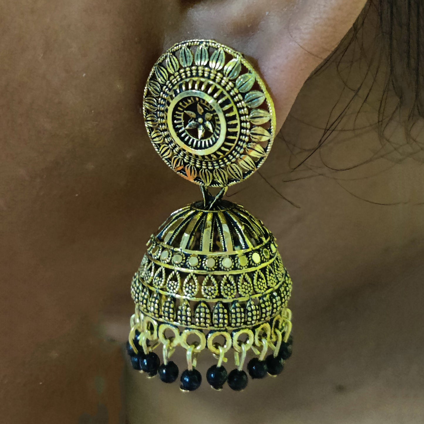 Vastradi Alloy Golden Traditional Jhumka in Black Colour