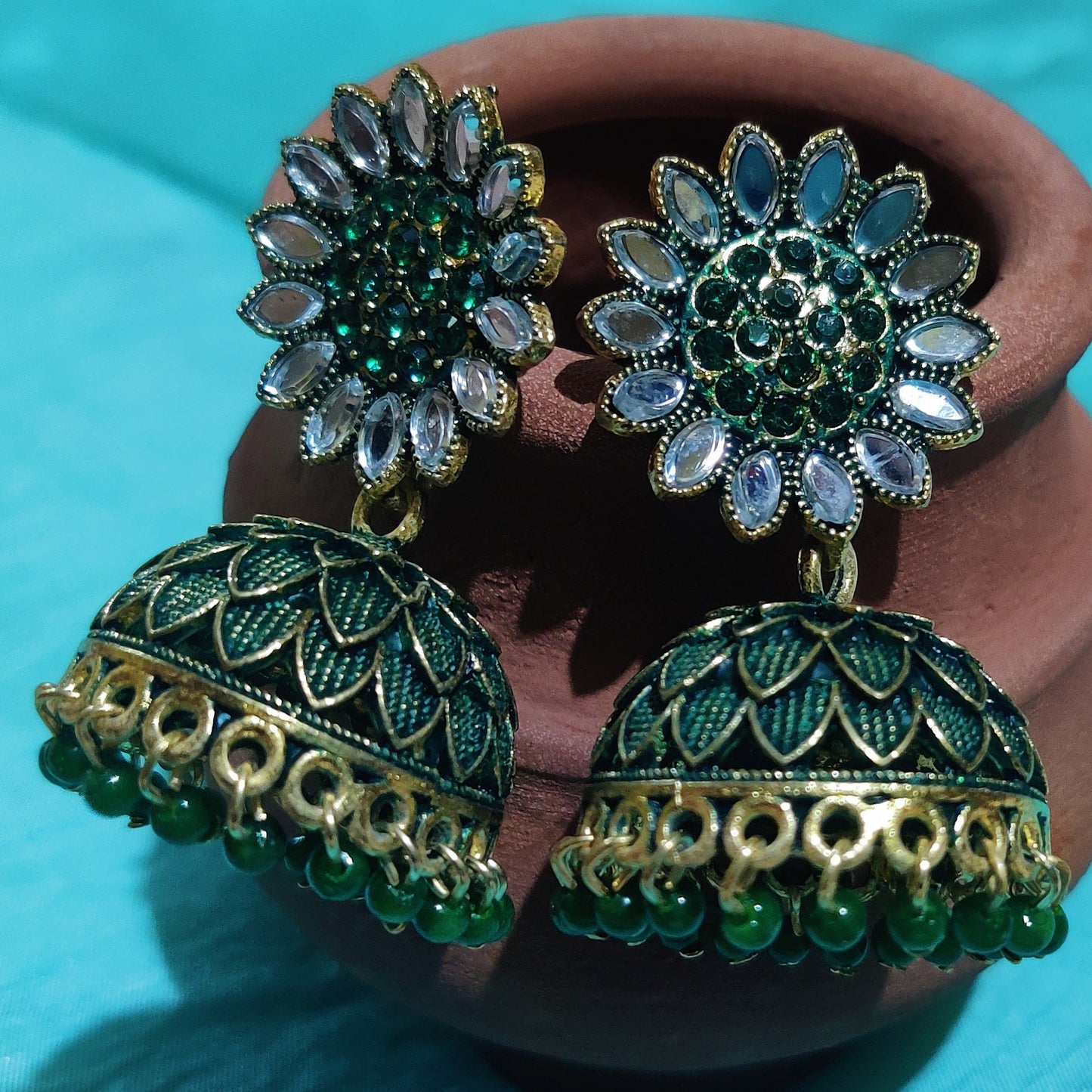 Vastradi Alloy Golden Traditional Jhumka in Green Colour