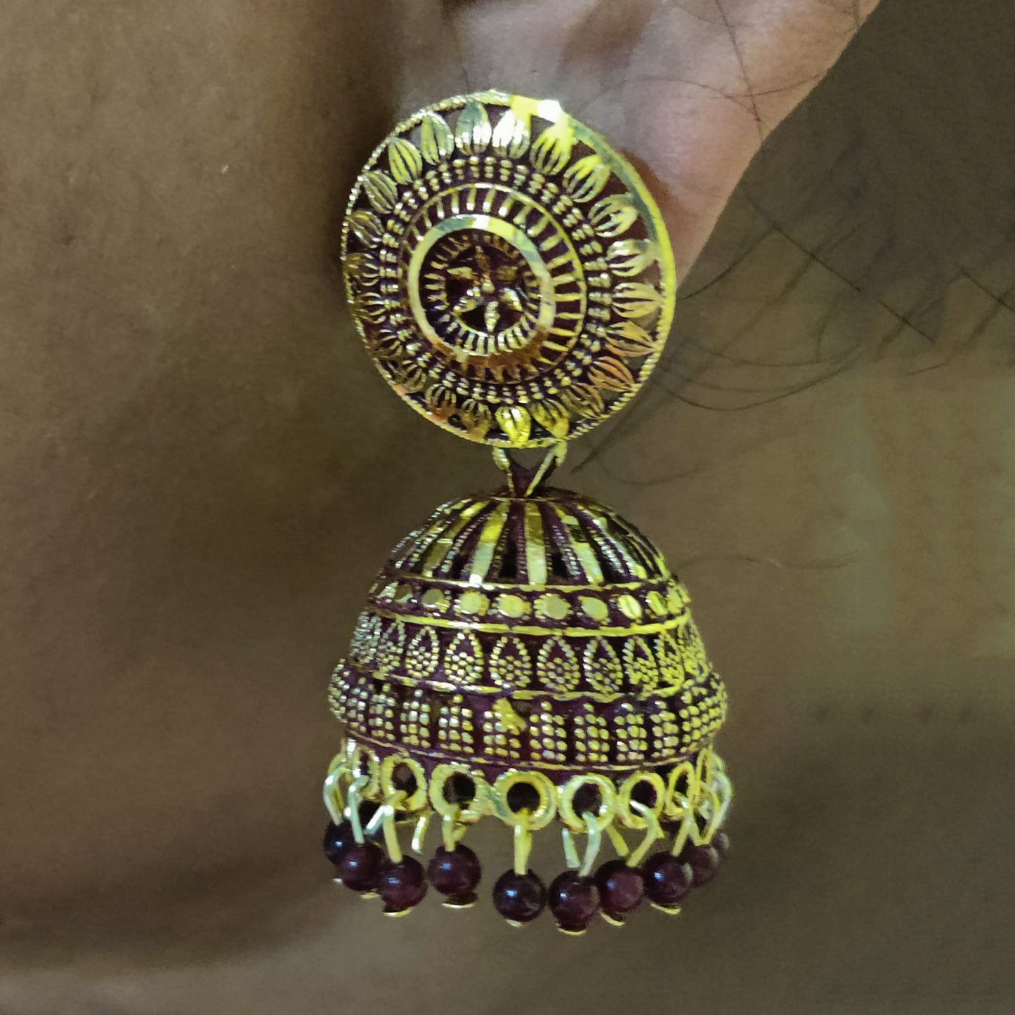 Vastradi Alloy Golden Traditional Jhumka in Maroon Colour